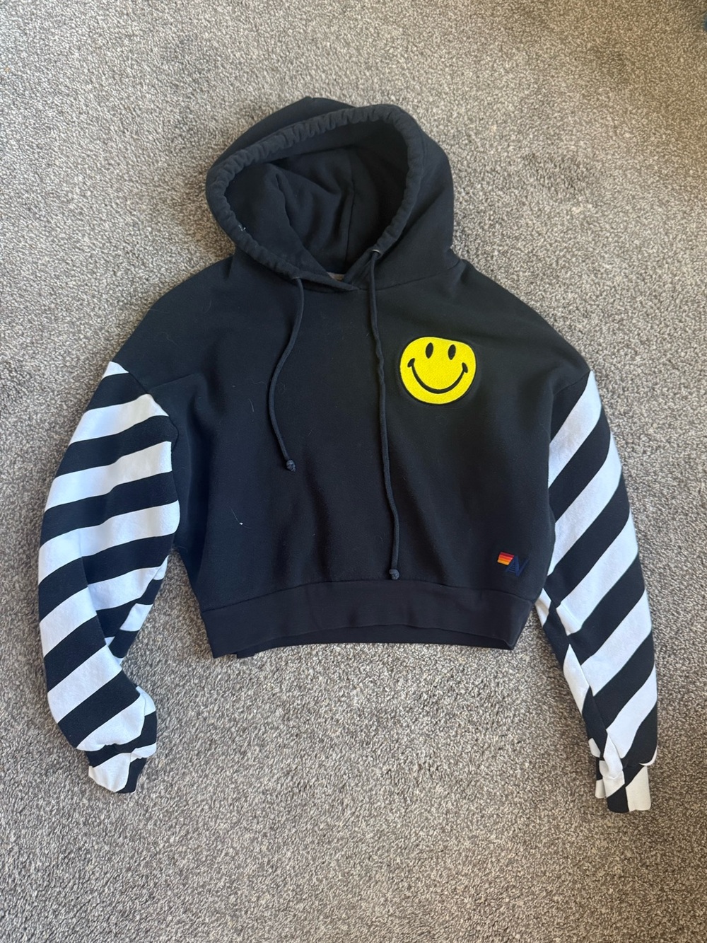 Aviator nation Caution Stripe Sleeve Smiley
Relaxed Hoodie in Black & White Xs